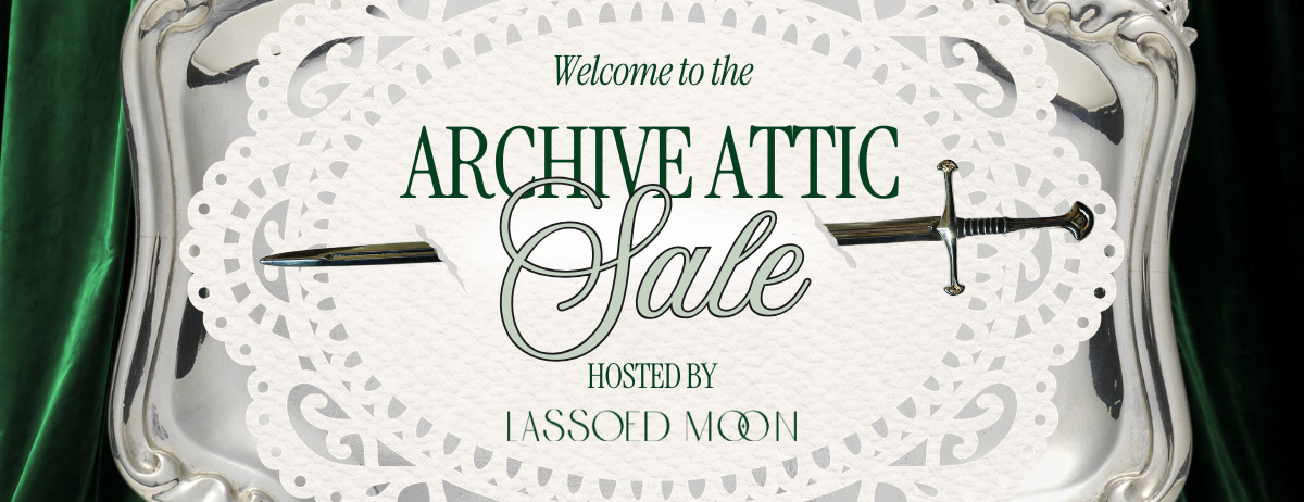 Decorative silver tray with 'Archive Attic Sale' text on a green background